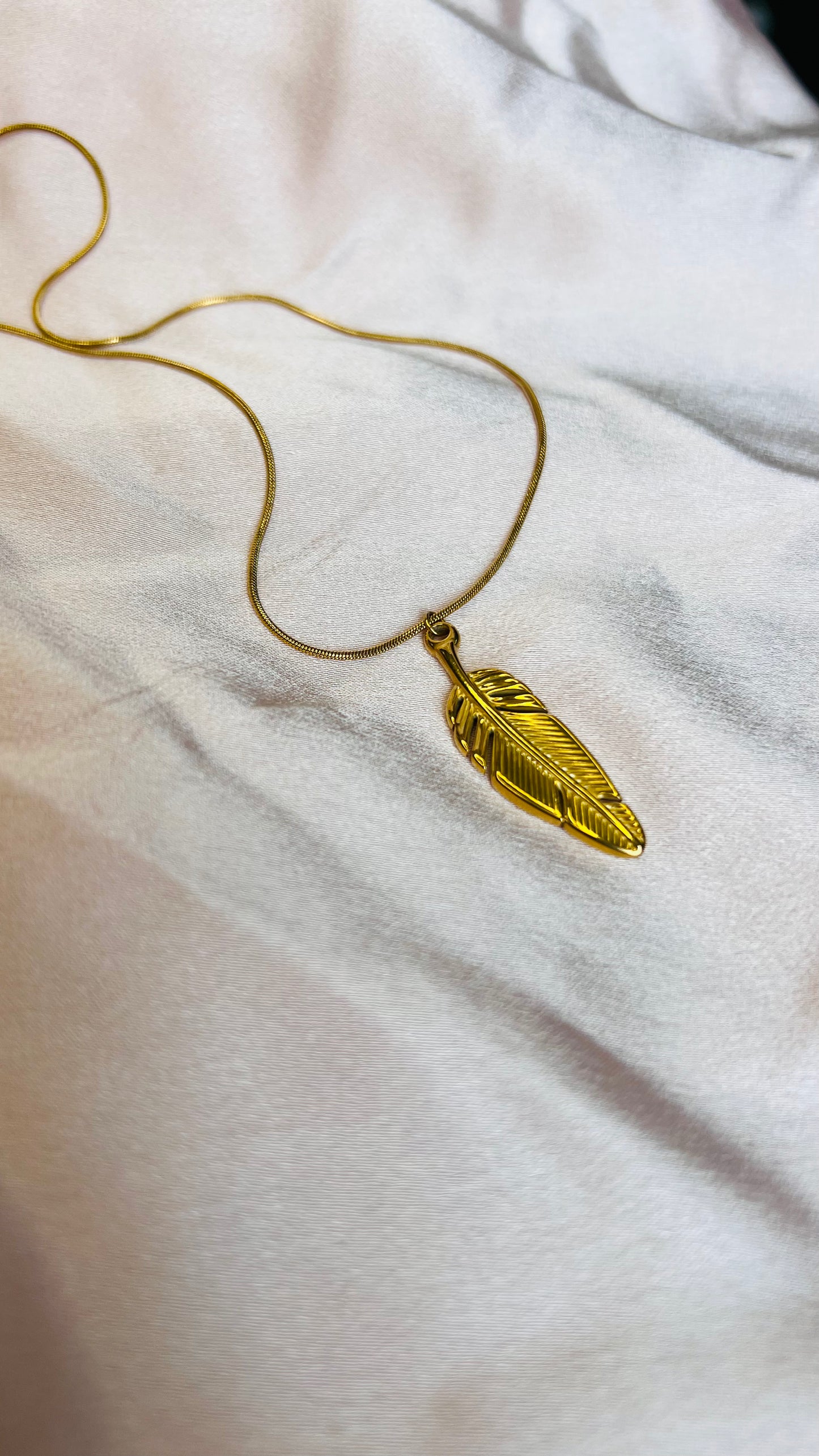 The Feather of Becoming – Golden Pendant Necklace