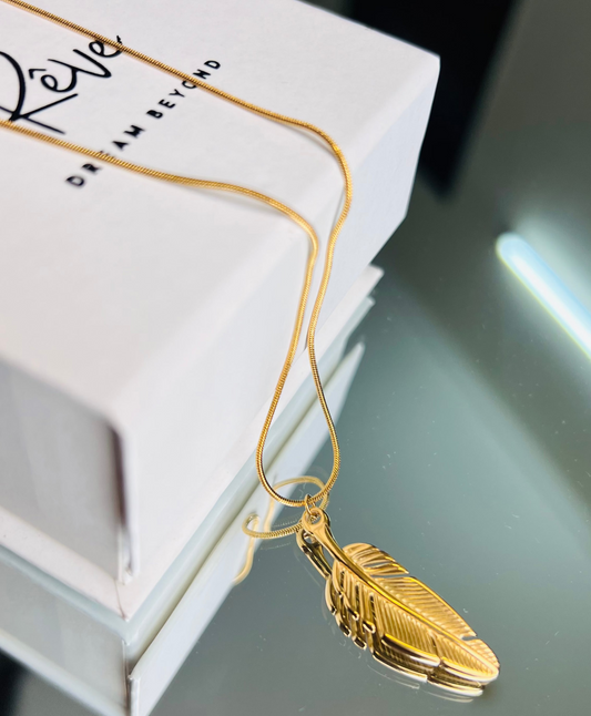 The Feather of Becoming – Golden Pendant Necklace